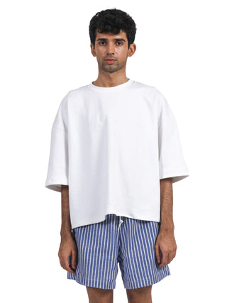 White Tee with Green Hair-On Leather Arezou Patch – Oversized Sleeves