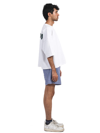 White Tee with Green Hair-On Leather Arezou Patch – Oversized Sleeves